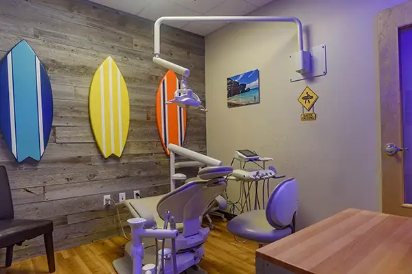 A colorful kid-friendly surf-themed room at Jacobsen Pediatric Dentistry.